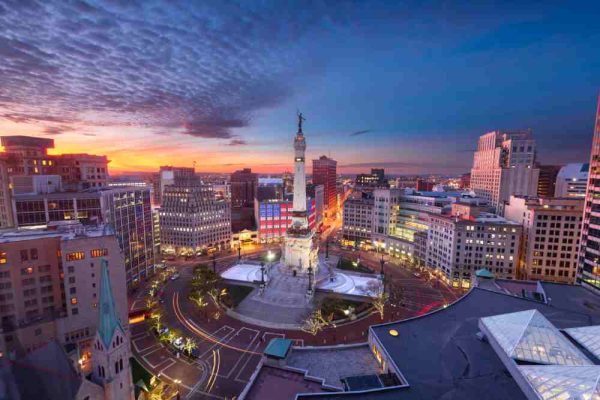 Indianapolis, Indiana, USA skyline over Monument Circle at dusk.